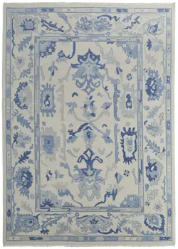 8' X 10' Ivory and Blue Wool Floral Hand Knotted Area Rug With Fringe