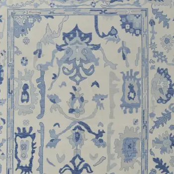 9' X 13' Ivory and Blue Wool Floral Hand Knotted Area Rug With Fringe