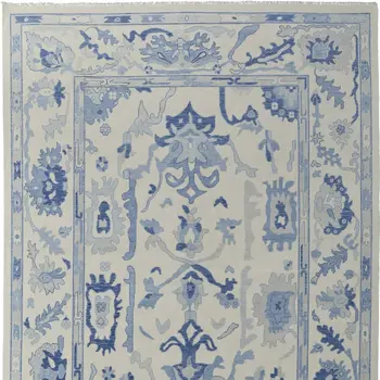 9' X 13' Ivory and Blue Wool Floral Hand Knotted Area Rug With Fringe