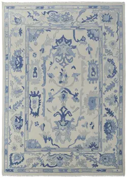 9' X 13' Ivory and Blue Wool Floral Hand Knotted Area Rug With Fringe