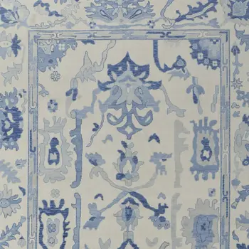 2' X 3' Ivory and Blue Wool Floral Hand Knotted Area Rug With Fringe