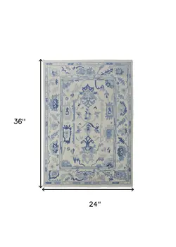 2' X 3' Ivory and Blue Wool Floral Hand Knotted Area Rug With Fringe
