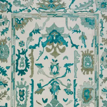 8' X 10' Green and Ivory Wool Floral Hand Knotted Area Rug With Fringe