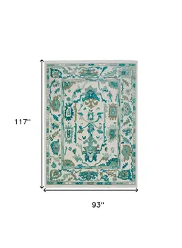 8' X 10' Green and Ivory Wool Floral Hand Knotted Area Rug With Fringe