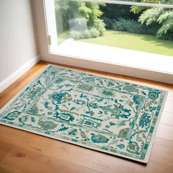 9' X 13' Green and Ivory Wool Floral Hand Knotted Area Rug With Fringe