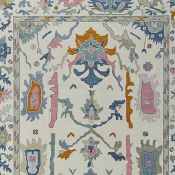 6' X 9' Blue Ivory and Pink Wool Floral Hand Knotted Area Rug With Fringe