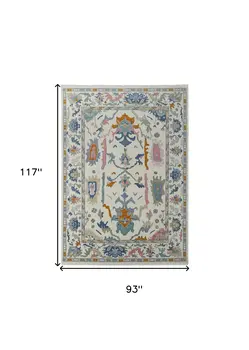 8' X 10' Blue Ivory and Pink Wool Floral Hand Knotted Area Rug With Fringe