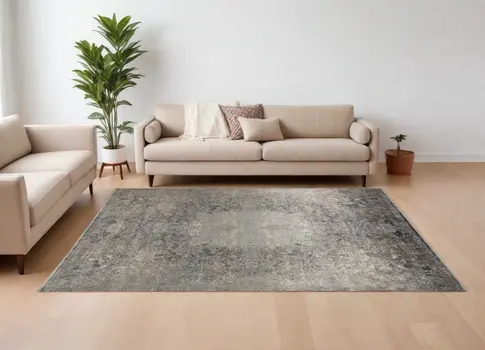 8' X 10' Tan and Gray Oriental Power Loom Worn Faded Area Rug