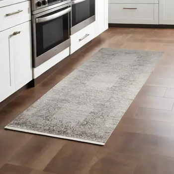 8' Gray and Ivory Oriental Power Loom Worn Faded Runner Rug