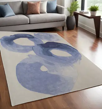 5' X 8' Blue and Ivory Abstract Hand Tufted Area Rug