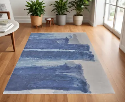 4' X 6' Blue and Ivory Abstract Hand Tufted Area Rug