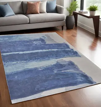 5' X 8' Blue and Ivory Abstract Hand Tufted Area Rug