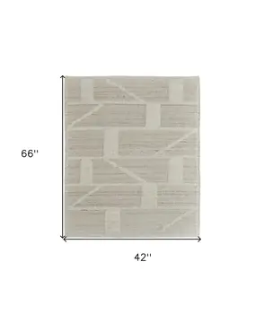 4' X 6' Tan and Ivory Wool Geometric Hand Woven Area Rug