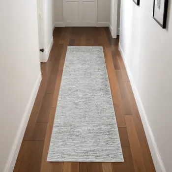 8' Ivory Gray and Green Abstract Power Loom Worn Faded Runner Rug
