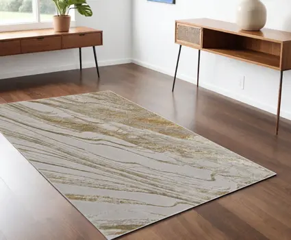 4' X 6' Ivory Brown and Gold Abstract Power Loom Area Rug