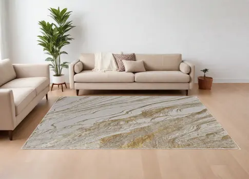 8' X 10' Ivory Brown and Gold Abstract Power Loom Area Rug