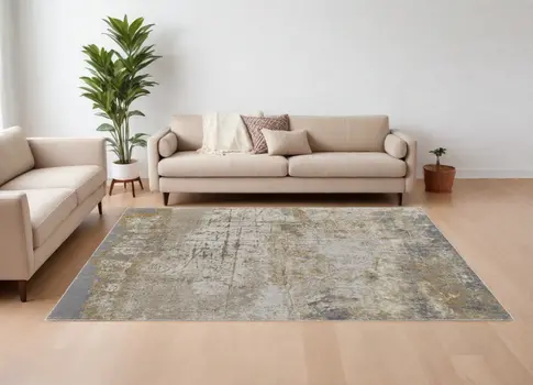 10' X 13' Ivory Gray and Brown Abstract Power Loom Worn Faded Area Rug