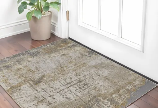 2' X 3' Ivory Gray and Brown Abstract Power Loom Worn Faded Area Rug