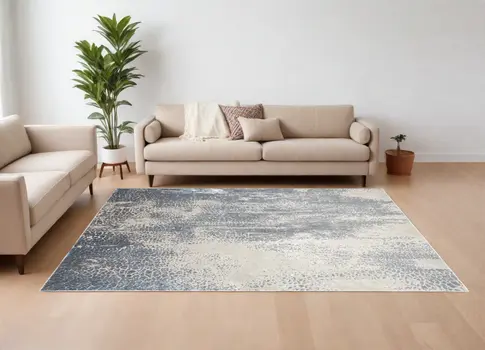 8' X 10' Ivory Gray and Blue Abstract Power Loom Area Rug
