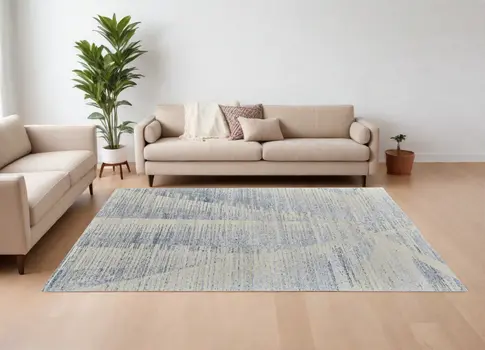 12' X 15' Ivory and Blue Abstract Hand Knotted Worn Faded Area Rug