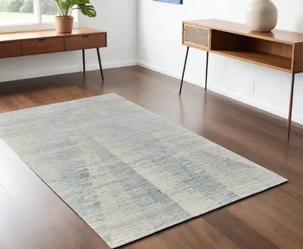 4' X 6' Ivory and Blue Abstract Hand Knotted Worn Faded Area Rug
