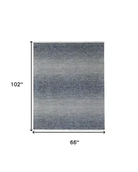 6' X 9' Ivory Gray and Blue Wool Hand Knotted Area Rug With Fringe