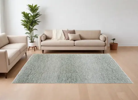 6' X 9' Ivory and Green Wool Hand Knotted Area Rug With Fringe