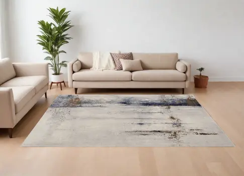 9' X 12' Ivory Blue and Brown Abstract Power Loom Area Rug
