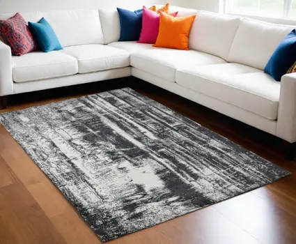 5' X 8' Black and Gray Abstract Hand Woven Area Rug