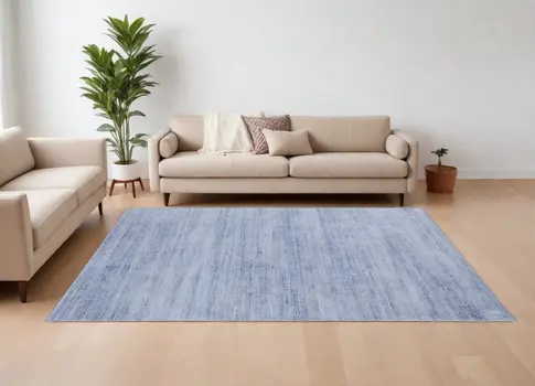 7' X 10' Blue and Ivory Power Loom Area Rug