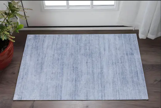 2' X 3' Blue and Ivory Power Loom Area Rug