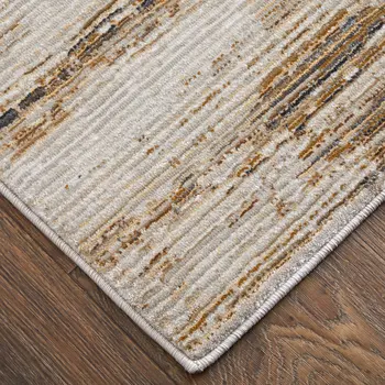 2' X 3' Ivory and Tan Abstract Power Loom Worn Faded Area Rug