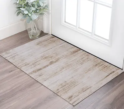 2' X 3' Ivory and Tan Abstract Power Loom Worn Faded Area Rug