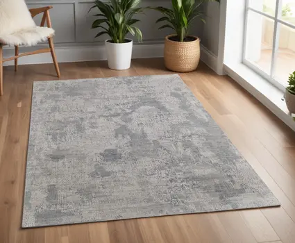 4' X 6' Gray and Silver Abstract Hand Woven Worn Faded Area Rug