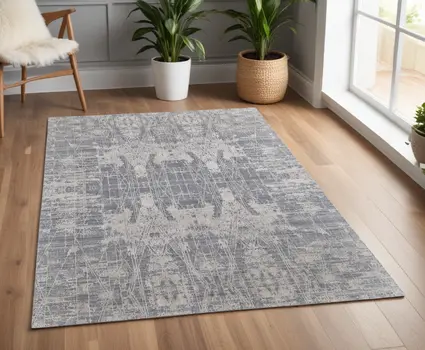 4' X 6' Gray and Silver Abstract Hand Woven Worn Faded Area Rug