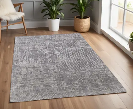 4' X 6' Gray and Silver Abstract Hand Woven Worn Faded Area Rug