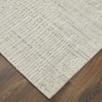 5' X 8' Ivory and Gray Abstract Hand Woven Worn Faded Area Rug