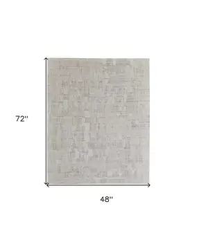 4' X 6' Ivory and Gray Abstract Hand Woven Worn Faded Area Rug