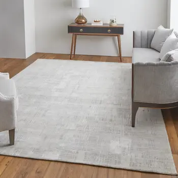 8' X 10' Ivory and Gray Abstract Hand Woven Worn Faded Area Rug