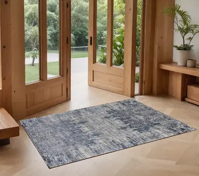 3' X 5' Blue and Ivory Abstract Hand Woven Worn Faded Area Rug
