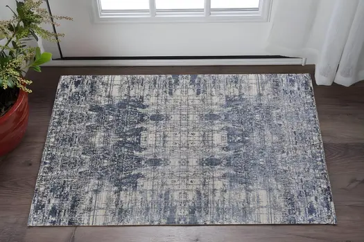 2' X 3' Blue and Ivory Abstract Hand Woven Worn Faded Area Rug