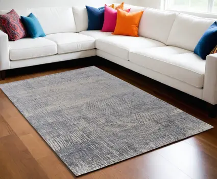 5' X 8' Gray Ivory and Blue Abstract Hand Woven Worn Faded Area Rug