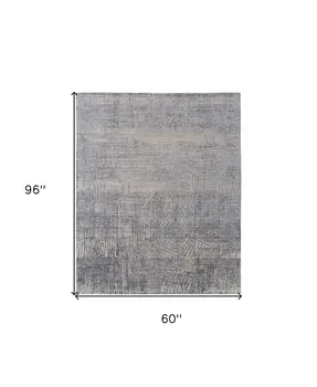 5' X 8' Gray Ivory and Blue Abstract Hand Woven Worn Faded Area Rug
