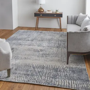2' X 3' Gray Ivory and Blue Abstract Hand Woven Worn Faded Area Rug