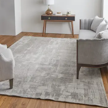 4' X 6' Gray and Ivory Abstract Hand Woven Worn Faded Area Rug