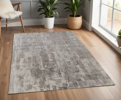 4' X 6' Gray and Ivory Abstract Hand Woven Worn Faded Area Rug