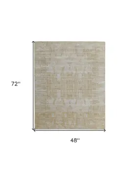 4' X 6' Yellow and Ivory Abstract Hand Woven Area Rug