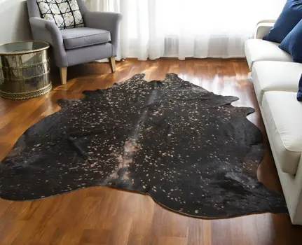 8' X 10' Brown and Tan Cowhide Animal Print Power Loom Area Rug