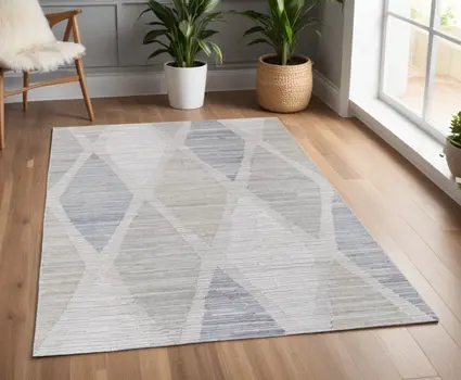 4' X 6' Ivory and Blue Geometric Hand Woven Area Rug