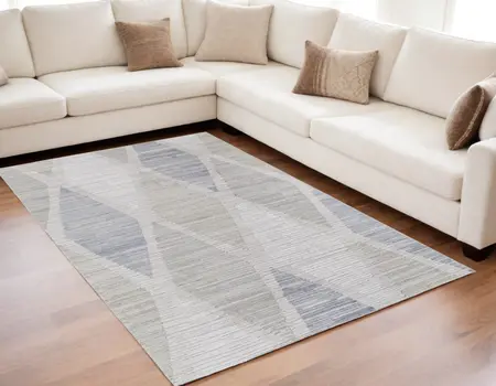 5' X 8' Ivory and Blue Geometric Hand Woven Area Rug